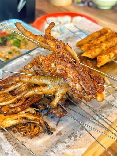 Grilled chicken feet skewers